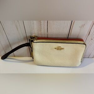 Coach dual pocket wristlet in pink and white